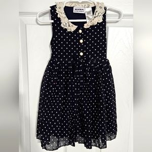 Navy blue polkadot dress with pearl buttons
